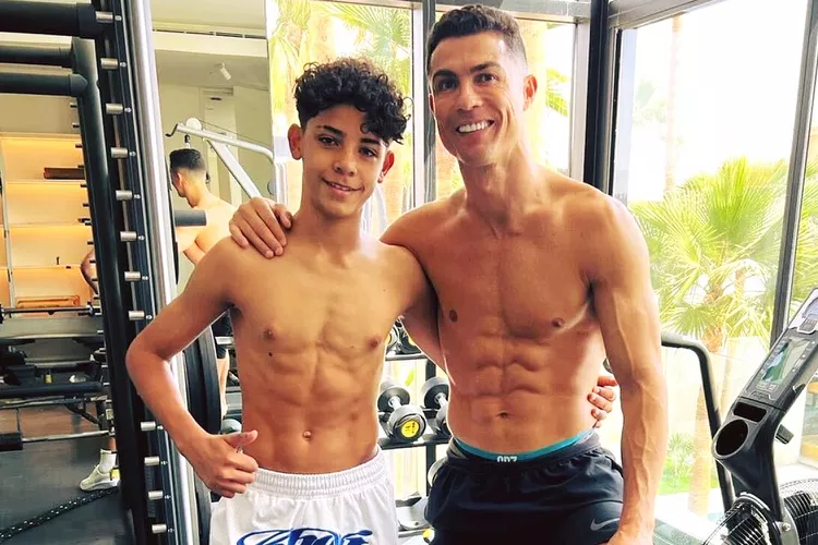 Cristiano Ronaldo and Son Cristiano Jr., 13, Go Shirtless in the Gym as They Show Off Their Abs: ‘My Partner’